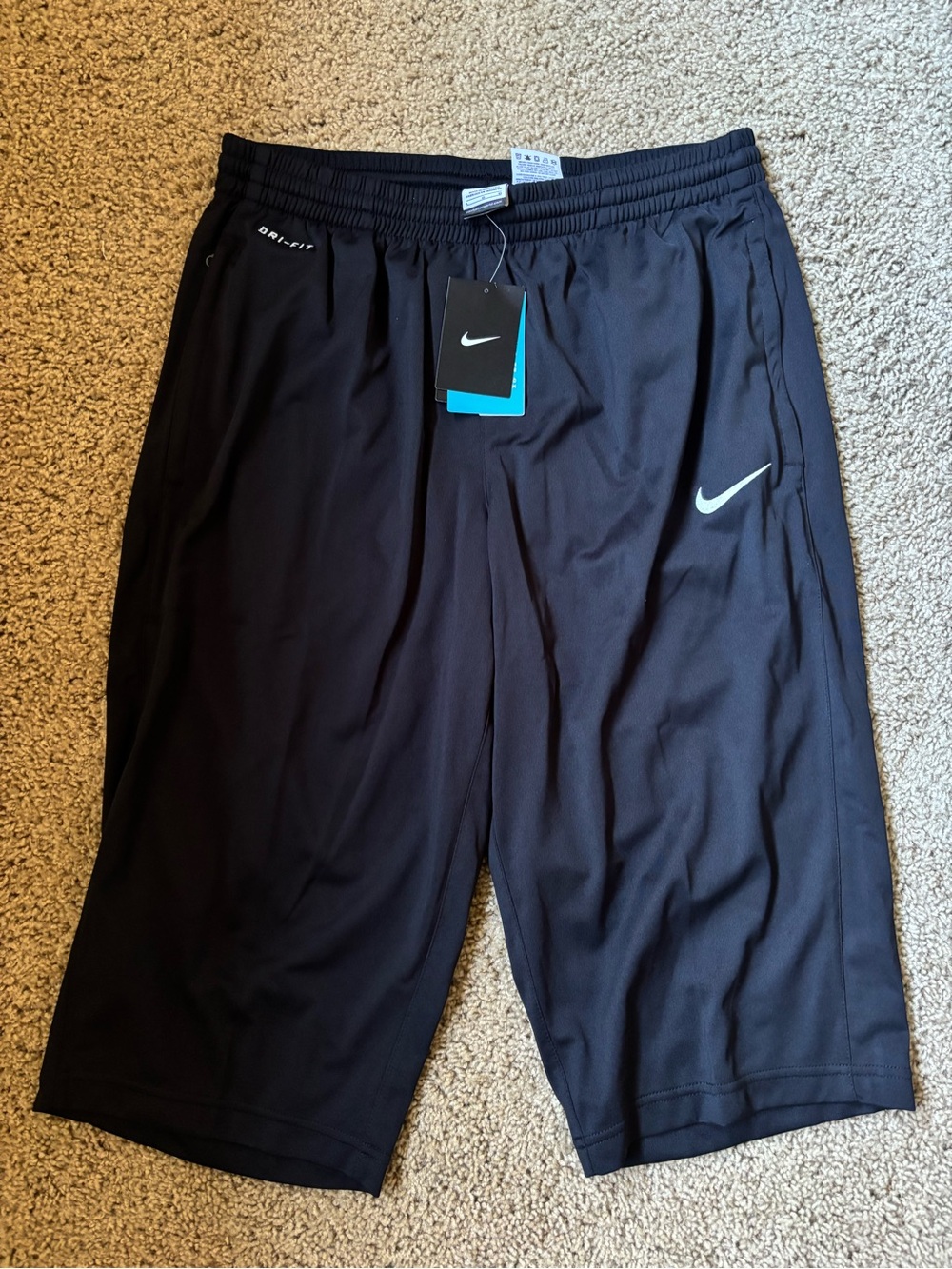 Nike Men’s Black Athletic Shorts with White Swoosh